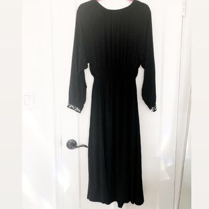 Tea length long sleeve black dress